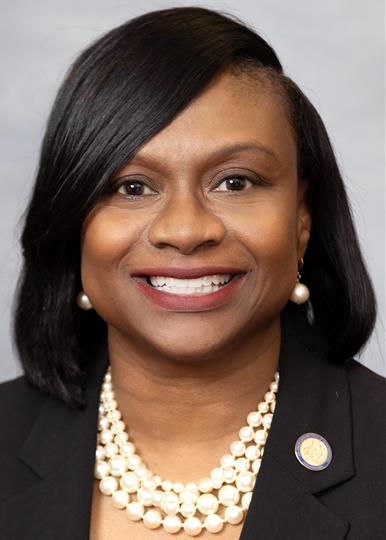 Headshot of  Monika Johnson-Hostler