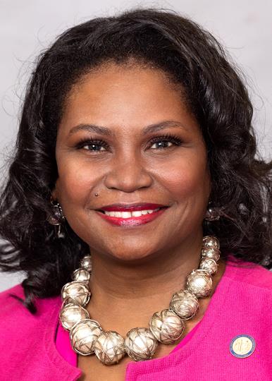 Headshot of  Aisha O. Dew